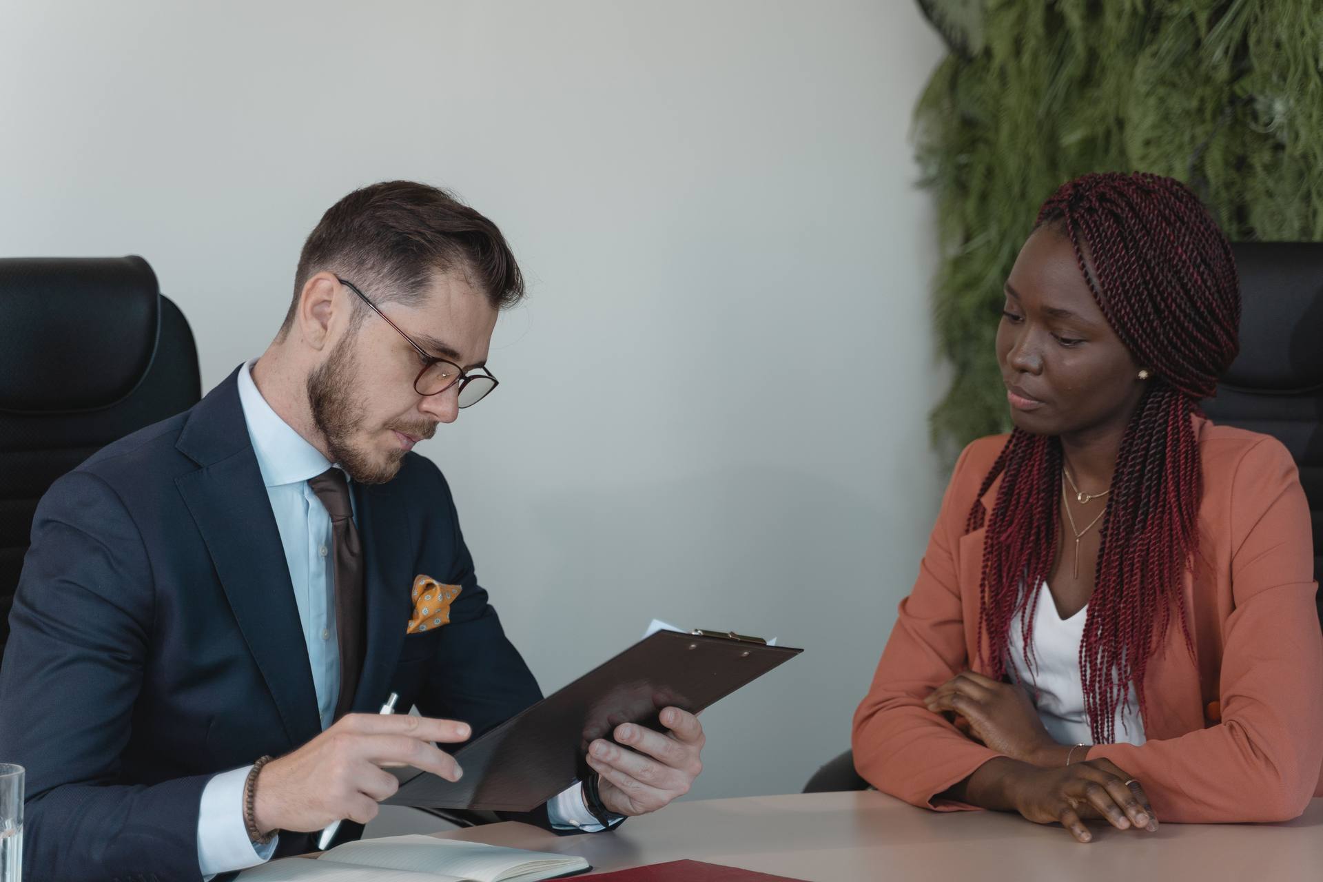 Business professionals reviewing documents