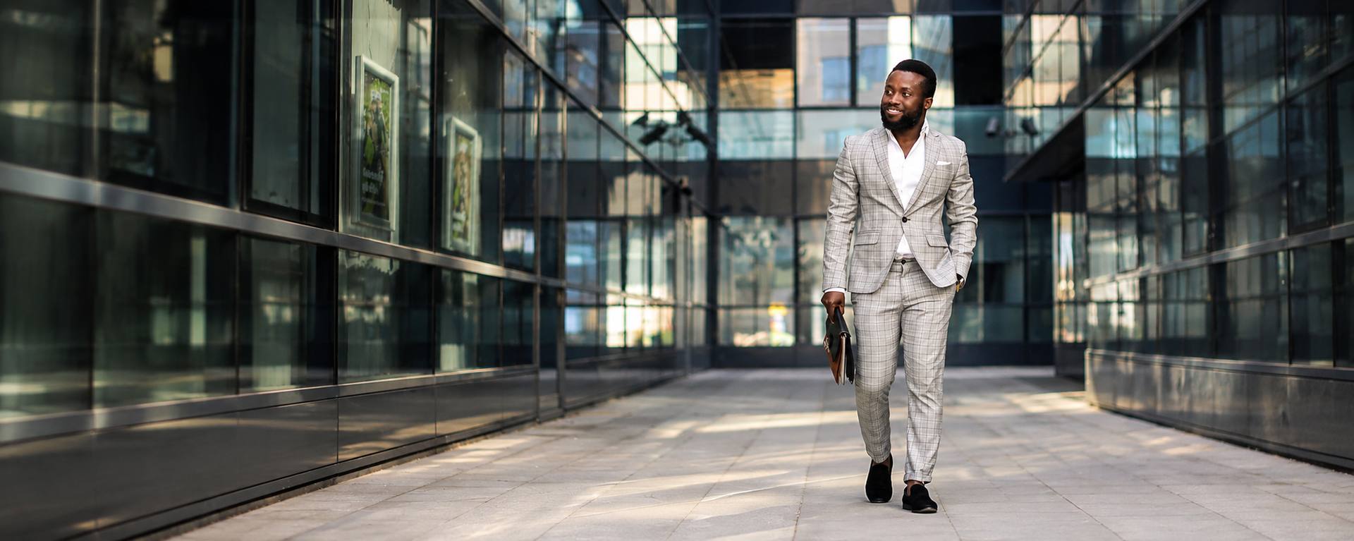 Professional walking through corporate corridor